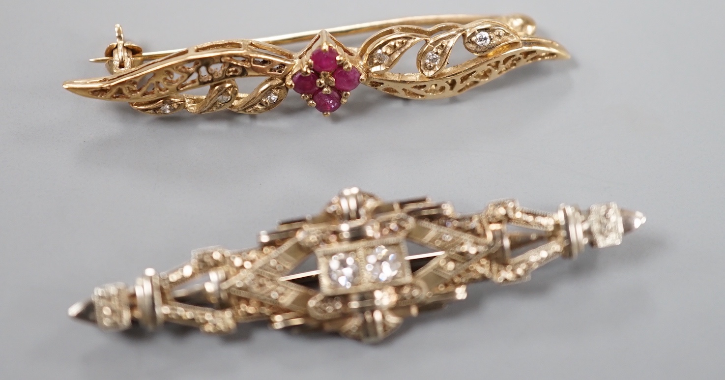 A modern 375, ruby and diamond chip set bar brooch, 44mm, gross 2.8 grams and an Austro Hungarian bar brooch.